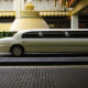 White limousine in front of a grand entrance casino